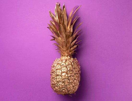 creative-layout-gold-pineapple-on-violet-backgroun-NJ6LXD5-scaled.jpg