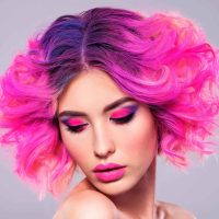portrait-of-beautiful-young-woman-with-bright-pink-BF686FY-scaled-1.jpg